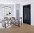 Stainless Steel barn door kit installed in a dining room