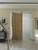 Modern barndoor hardware in stainless finish used for wood door in a home 